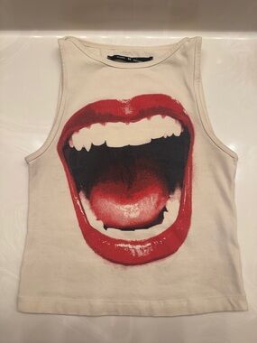 silence + noise cream tank top with open mouth design